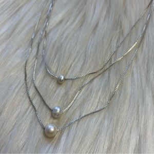 Tripple pearl layered silver tone necklace